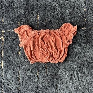 Distressed orange scrunch crop top